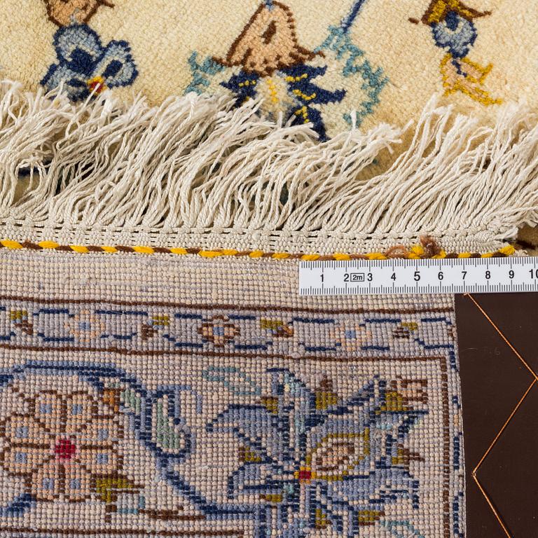 A semiantigue carpet, Keshan signed part silk, circa 383x294 cm.