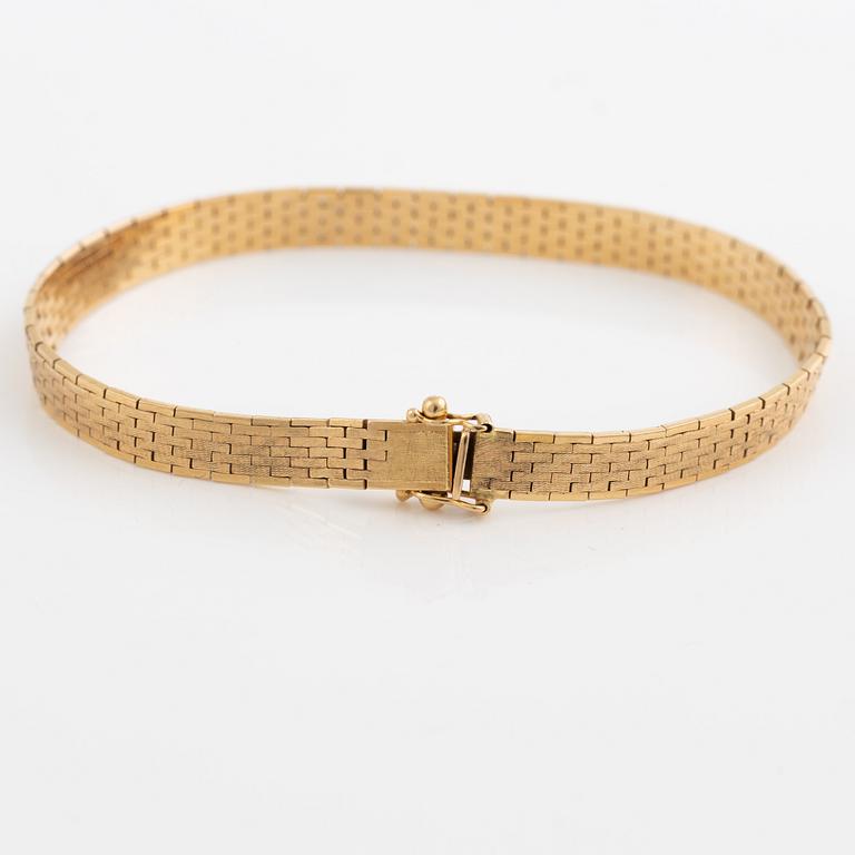 Armlänk, 18K guld.