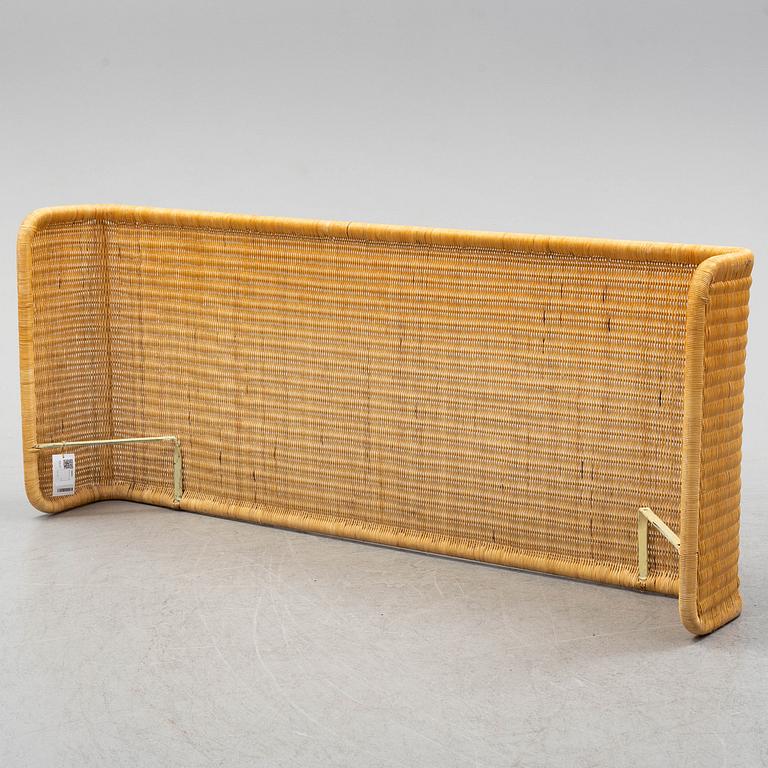 A late 20th century rattan bedside.