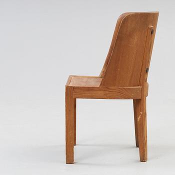 An Axel Einar Hjorth 'Lovö' stained pine armchair, Nordiska Kompaniet, Sweden 1930's.