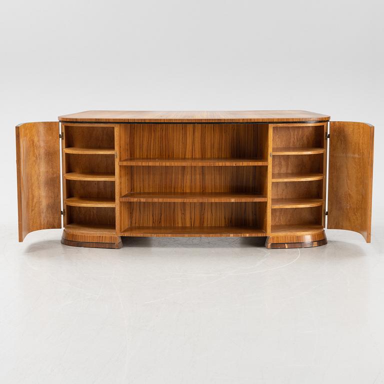 A zebrano veneered Swedish Modern desk, mid 20th Century.