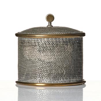 Björn Trägårdh, a pewter and brass lidded jar, model "A 2273", Firma Svenskt Tenn, Stockholm, 1944.