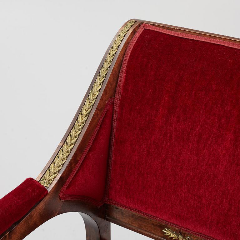 A pair of Empire style armchairs, first half of the 20th century.