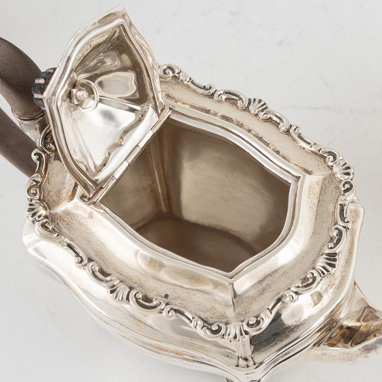 An English Silver Coffee Pot, Creamer and Sugar Bowl, mark of Josiah Williams & Co, London 1903-04.