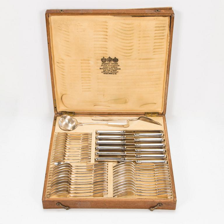 A 50-piece set of silver cutlery, maker's mark of  Nikolai Pavlov, Moscow 1908-17. Original box marked Nikolai Linden.