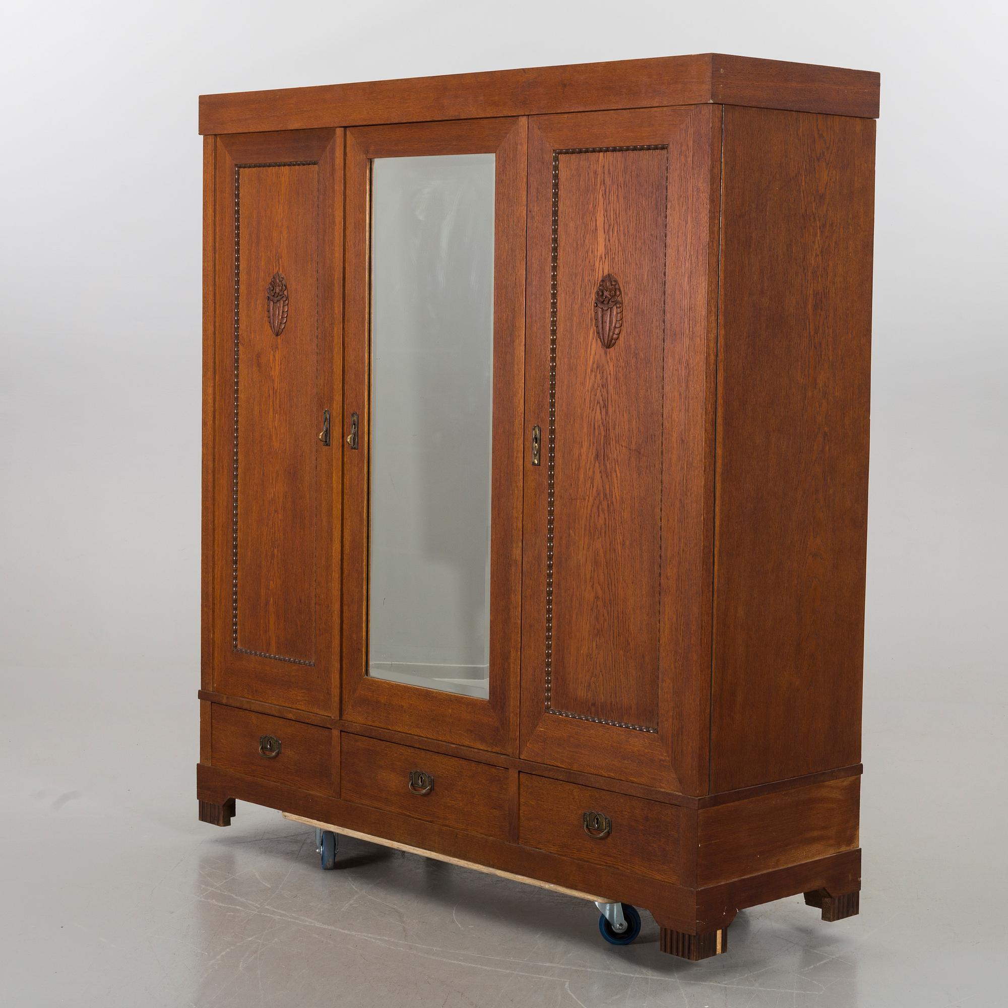 A ART NOUVEAU WARDROBE.