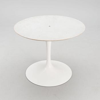A mid-20th century 'Tulip' table.