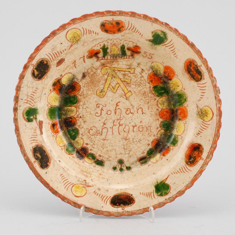 An Swedish ceramic plate, dated 1755.