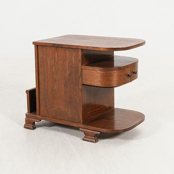 An Art Deco oak side table first half of the 20th century.