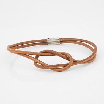 Hermès, a 'Atamé' leather knot necklace.