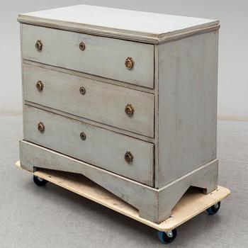 A mid 19th century painted chest of drawers.