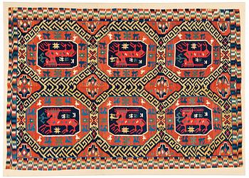 1149. TÄCKE.  Rölakan. Två ihopsydda delar. 187 x 130 cm. Sannolikt Skytts eller Oxie härad. Skåne 1700-talets andra hälft.