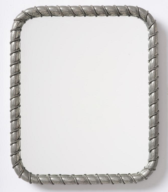 Estrid Ericson, a pewter framed mirror model "A 2518", Firma Svenskt Tenn, Stockholm, 1947.