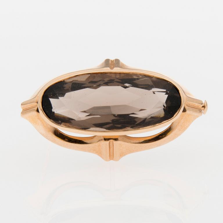 BROSCH, fasettslipad rökkvarts, 14K guld. Salovaara, Åbo 1961.