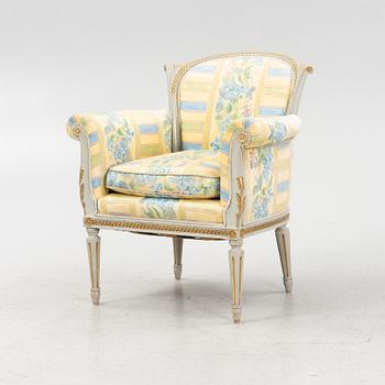 A Louis XVI style armchair, 20th Century.