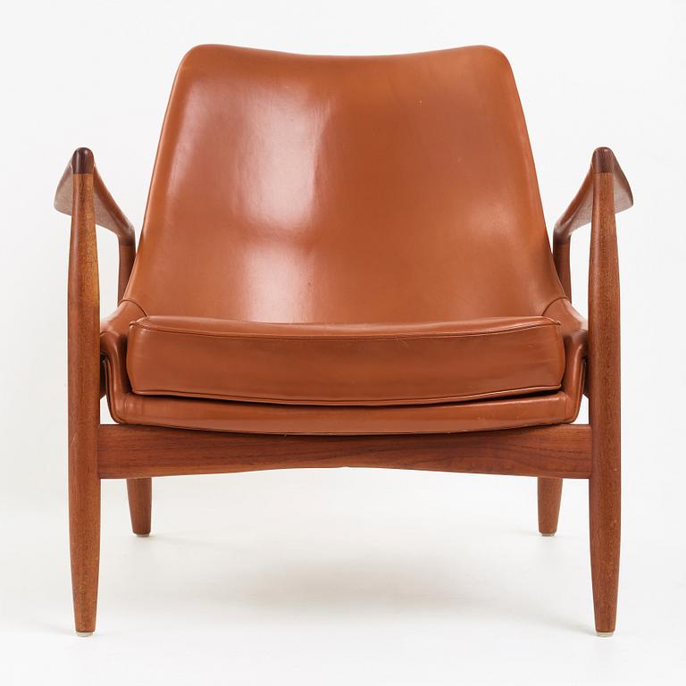 Ib Kofod-Larsen, a teak and brown leather "Seal" armchair, Olof Persons Fåtöljindustri (OPE), Sweden 1950's-60's.