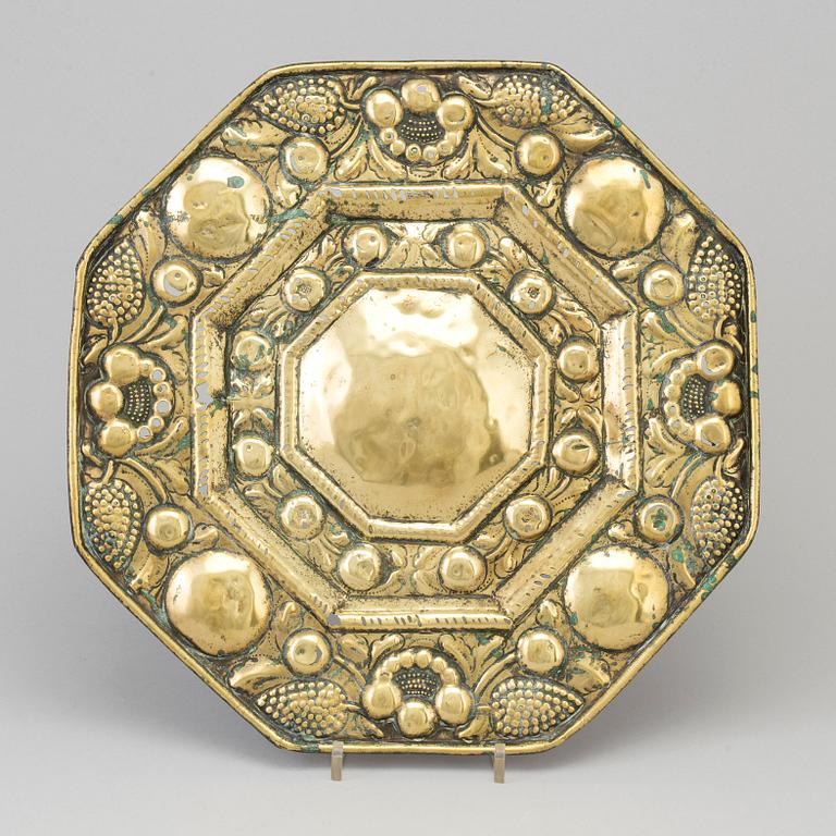 A BRASS DISH, probably 17th century.
