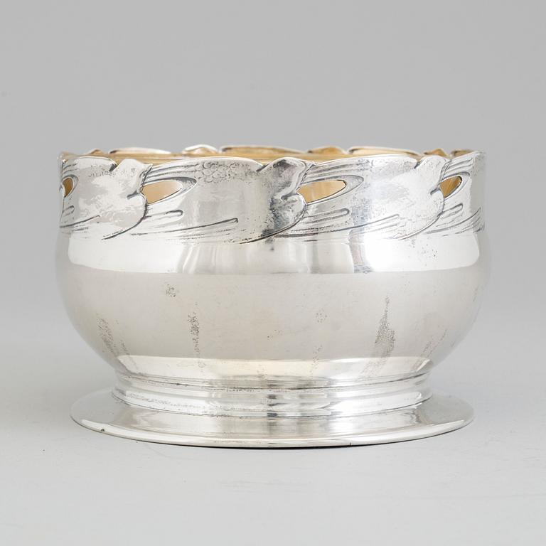 A Swedish Art Nouveau parcel-gilt caviar bowl with later glass liner, mark of GAB, Stockholm, 1911.