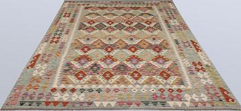 A Kelim rug, c. 296 x 201 cm.
