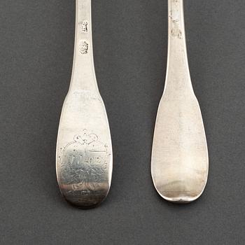 A matched set of nine 18th century silver spoons, marked Basel and Naunur (Belgum).