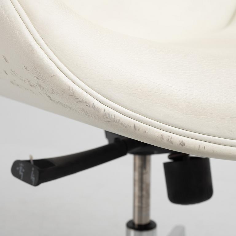 A contemporary swivel chair, Roche Bobois.