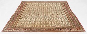 An antique Agra carpet Of Mughal 'Shrub' design, northern India, c. 270 x 180 cm.
