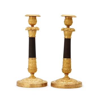 A pair of French Empire 19th century candlesticks.