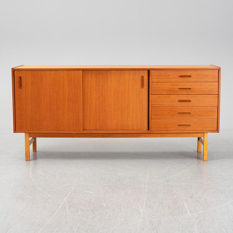 A second half of the 20th century teak veneered sideboard.