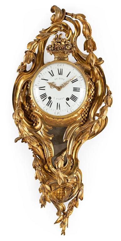 A Louis XV-style 19th Century wall clock, marked "Joseph Buzot A Paris".