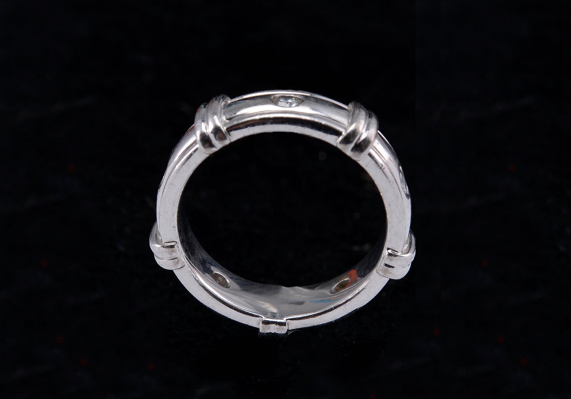 A RING, 5 brilliant cut diamonds c. 0.20 ct. A. Tillander Helsinki 2004. 18K white gold. Size 16-. Weight 8,2 g.