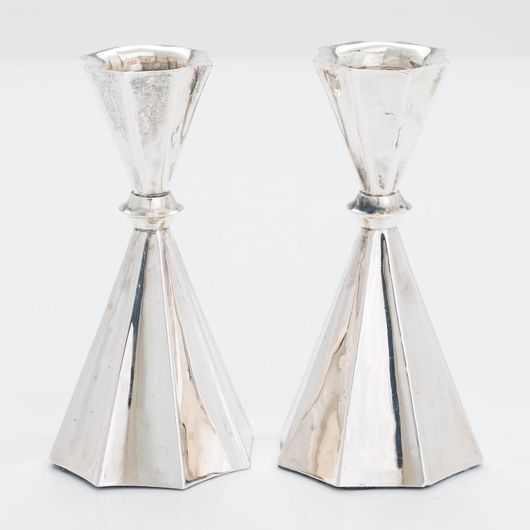 A 2-arm silver candle holder and a pair of silver candlesticks, Anna-Greta Eker and Hopearae Lasander, Turku 1965, 1963.