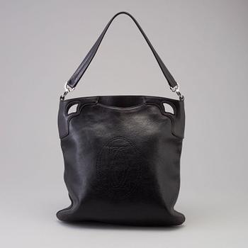 A bag "Marcello Reporter" by Cartier.