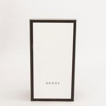 Gucci,.