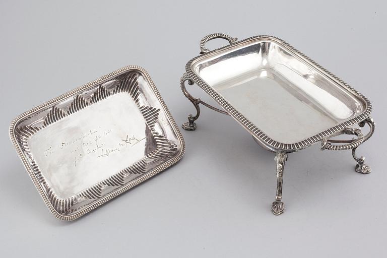 A silvered metal serving dish with rechaud, first half of the 20th century.