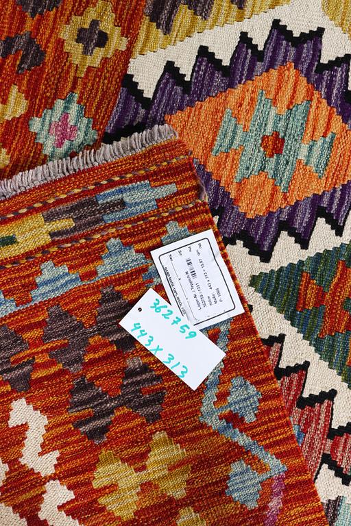 A Kilim carpet, c. 443 x 313 cm.