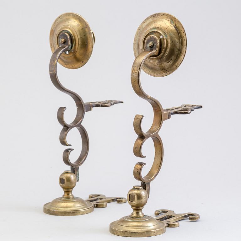 A PAIR OF BRONZE WALL LIGHTS, 17th/18th century.