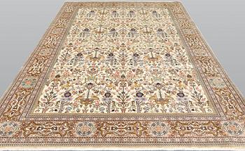 A Täbriz Tabatabai carpet, c.  352 x 240 cm.
