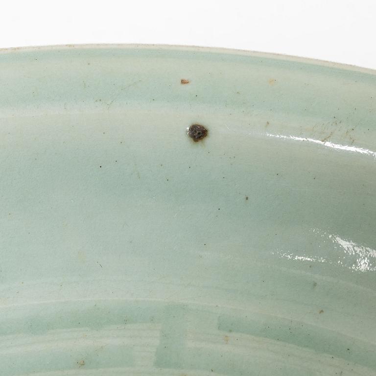 A Chinese celadon dish, Ming dynasty (1368-1644).