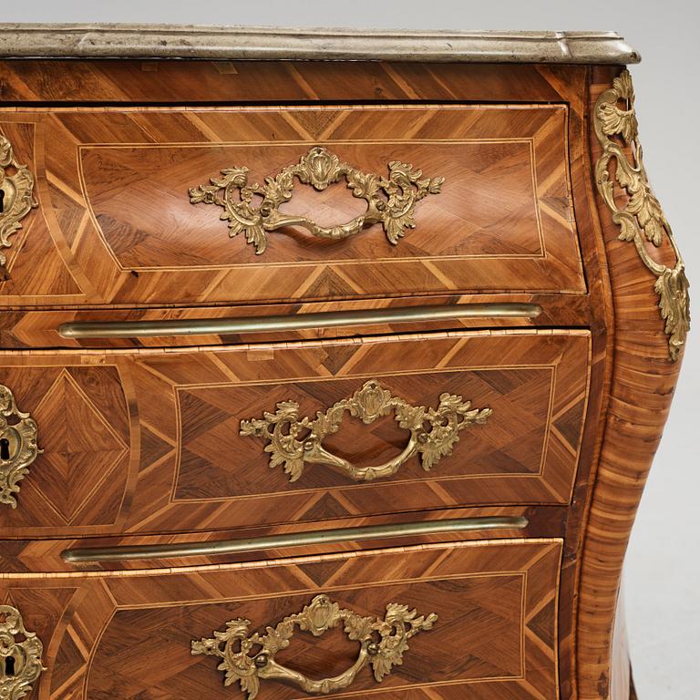 A rococo  gilt-brass mounted and rosewood parquetry commode by J. H. Reimers (master in Stockholm 1754-73).