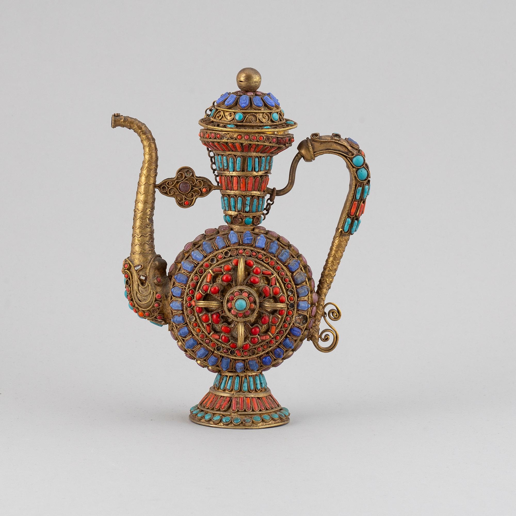 A Tibetan metal and stone inlay pot, 20th century.
