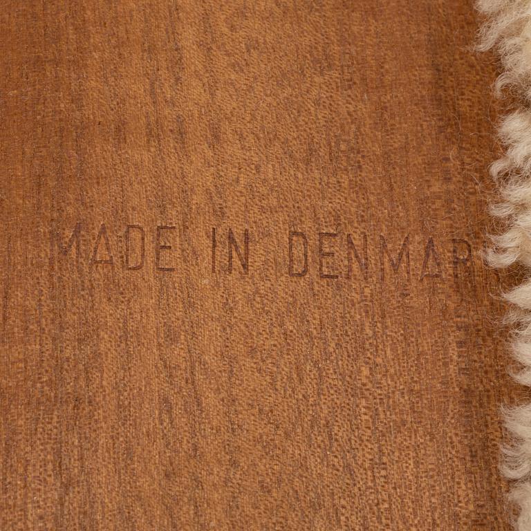 A set of six teak dining chairs upholstered in new sheepskin by Niels Koefoed, Denmark, 1960's.