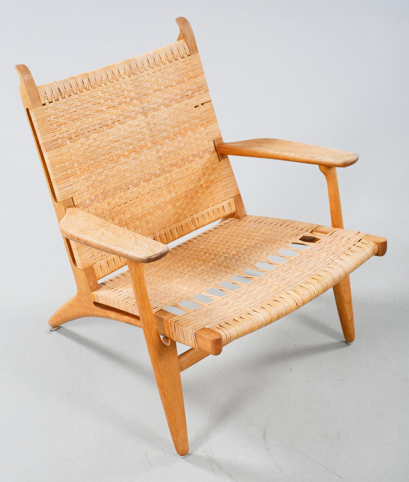 A CH-27 lounge chair, designed by Hans J Wegner for Carl Hansen & Son,