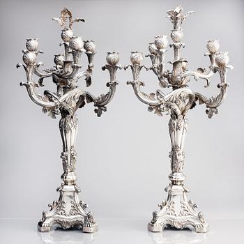 A pair of Swedish mid 19th century silver candelabra, marks of Gustaf Möllenborg, Stockholm 1844.
