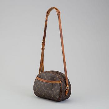 a LOUIS VUITTON bag.