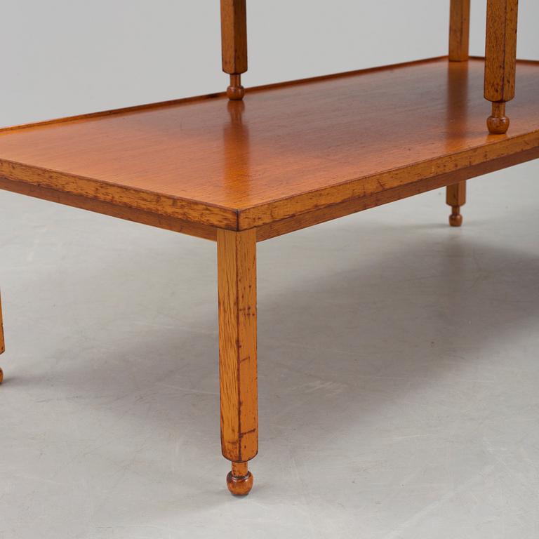 A mahogany sidetable model 1073 by Josef Frank for Firma Svenkt Tenn.