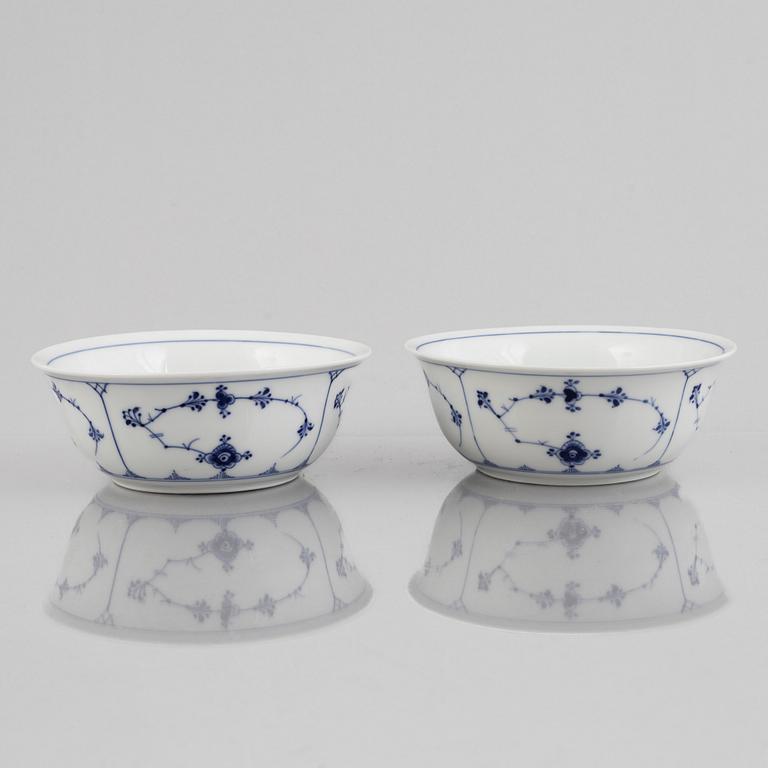 A set of three 'Blue Fluted' porcelain serving bowls and a bowl with cover, Royal Copenhagen, 1893-1900.