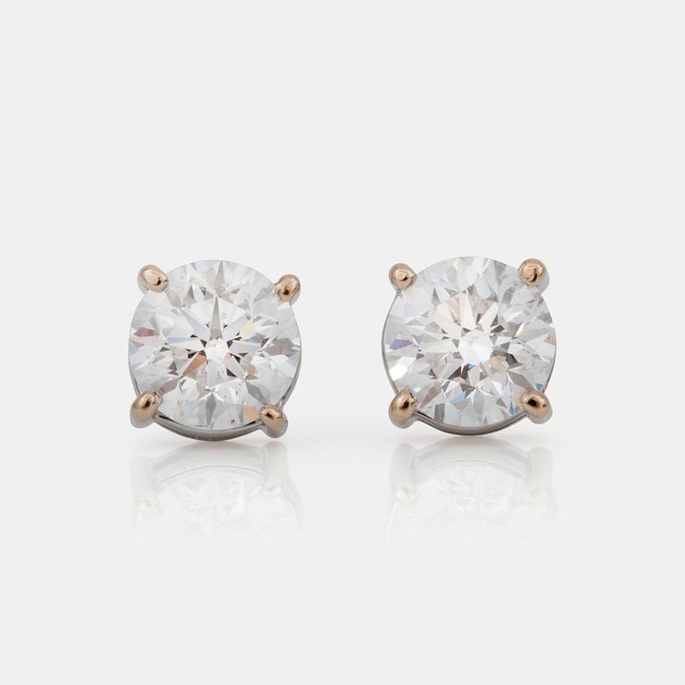 A pair of brilliant-cut diamond earrings. 1.00 ct and 1.01 ct. Quality D/SI1 according to IGI certificate.