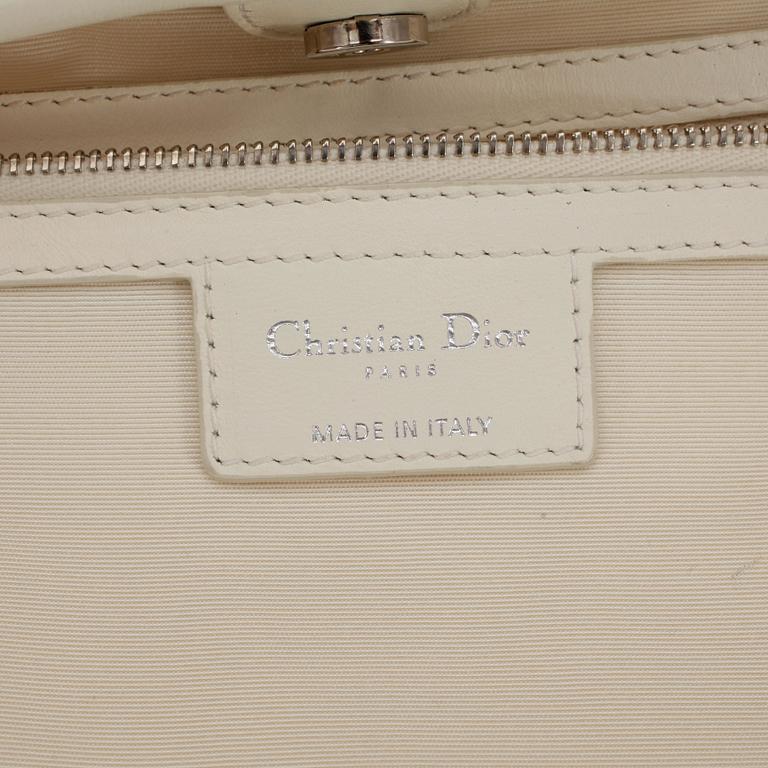 CHRISTIAN DIOR, a frosted white canvas "Dior Panarea" shopping bag.