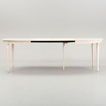 A dining table with eight chairs and a stool, Gustavian style, second half of the 20th Century.