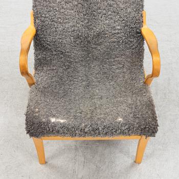 Bruno Mathsson, fåtölj och fotpall "Pernilla", Bruno Mathsson International 2004.